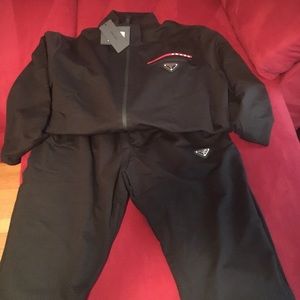Prada black sweatsuit with logo on top and bottom. 2XL but fits like XL. New.